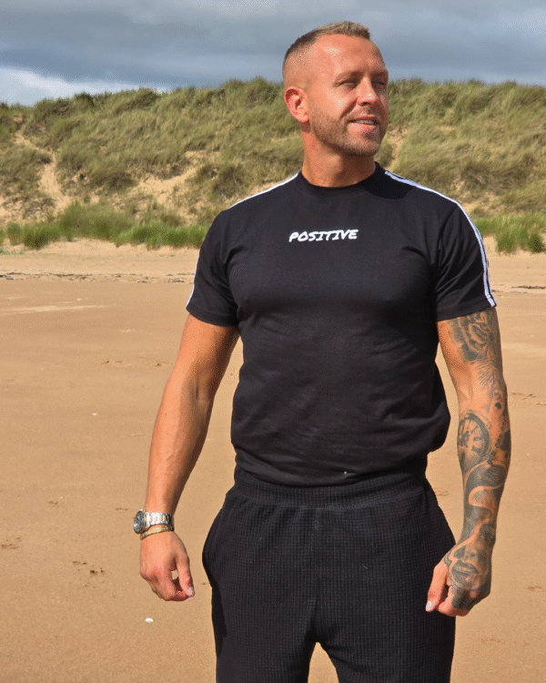 Men’s Black T-Shirt – “Positive” Chest Embroidery