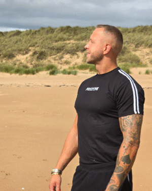 Men’s Black T-Shirt – “Positive” Chest Embroidery